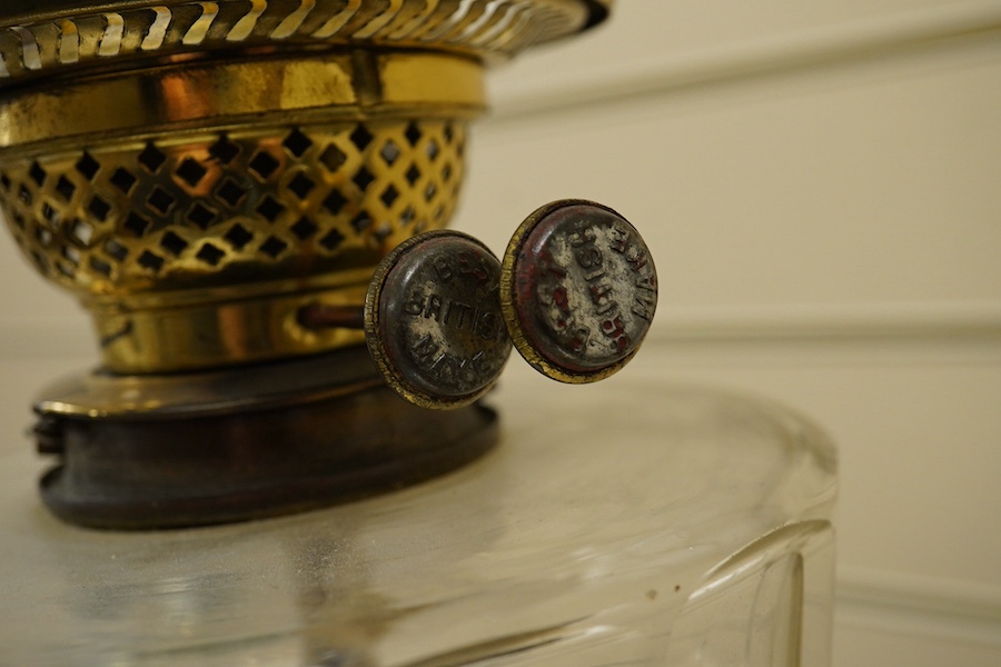 An Edwardian brass Corinthian columned oil lamp, 77cm high including funnel and shade. Condition - column good glass bowl, brass figments and funnel good, shade broken